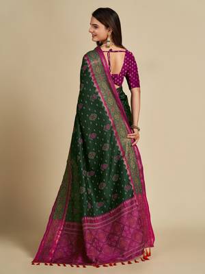 Dark green woven self design embellished pure silk patola saree with blouse 4