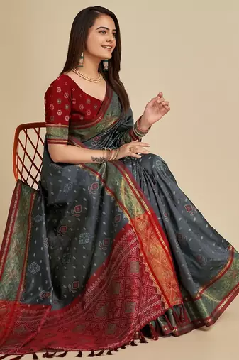 Grey woven self design embellished pure silk patola saree with blouse