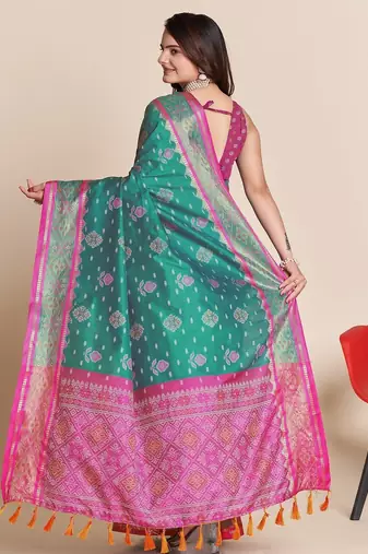 Rama woven self design embellished pure silk patola saree with blouse
