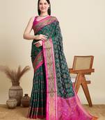Green woven self design embellished pure silk patola saree with blouse