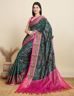 Green woven self design embellished pure silk patola saree with blouse 2