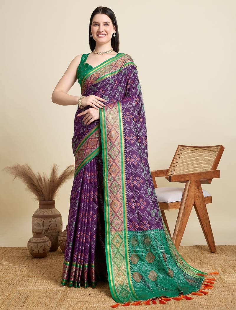 Purple woven self design embellished pure silk patola saree with blouse