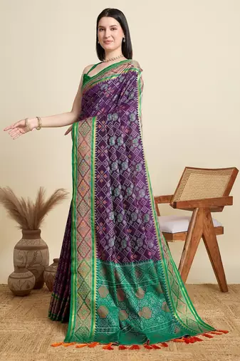 Purple woven self design embellished pure silk patola saree with blouse