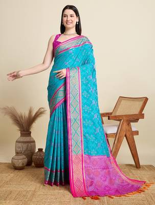 Teal blue woven self design embellished pure silk patola saree with blouse 1