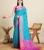 Teal blue woven self design embellished pure silk patola saree with blouse