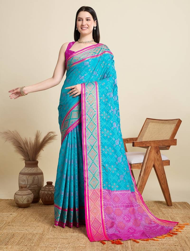 Teal blue woven self design embellished pure silk patola saree with blouse