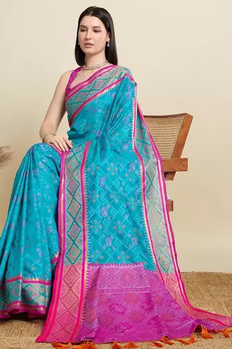 Teal blue woven self design embellished pure silk patola saree with blouse