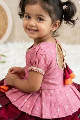 Girls pink tissue silk choli with ranipink floral embroidered lehenga set