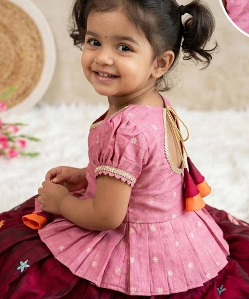 Girls pink tissue silk choli with ranipink floral embroidered lehenga set