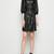 Women’s black lambskin leather shirt dress with belt & puff sleeves