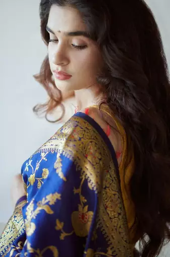 Blue silk blend banarasi saree with unstitched blouse piece
