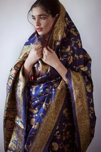 Blue silk blend banarasi saree with unstitched blouse piece
