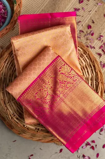 Peach pink silk blend banarasi saree with unstitched blouse piece