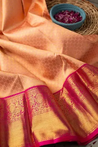 Peach pink silk blend banarasi saree with unstitched blouse piece