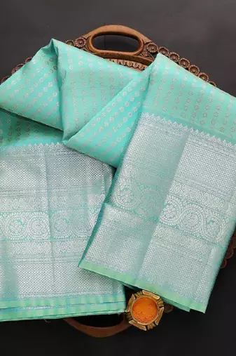 Sky blue silk blend banarasi saree with unstitched blouse piece