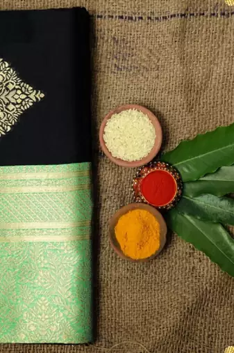Black green silk blend banarasi saree with unstitched blouse piece
