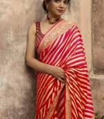 Red silk blend banarasi saree with unstitched blouse piece