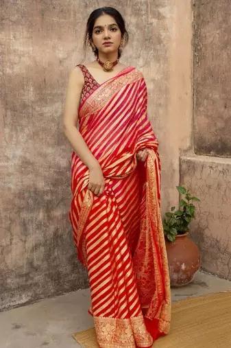 Red silk blend banarasi saree with unstitched blouse piece