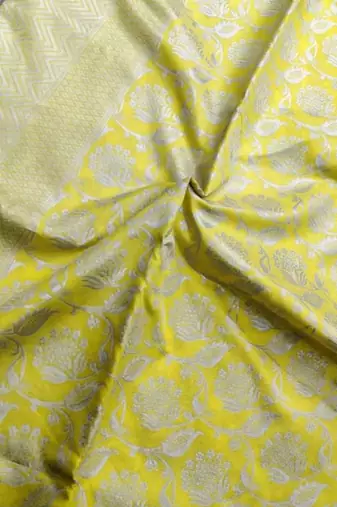 Yellow silk blend banarasi saree with unstitched blouse piece