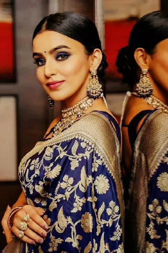 Blue silk blend banarasi saree with unstitched blouse piece