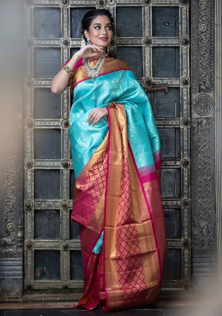 Sky blue pink soft silk blend banarasi jacuard work designer party wear saree with unstitched blouse piece