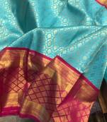 Sky blue pink silk blend banarasi saree with unstitched blouse piece
