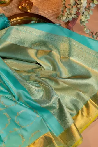 Rama silk blend banarasi saree with unstitched blouse piece