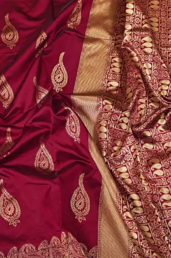 Maroon silk blend banarasi saree with unstitched blouse piece