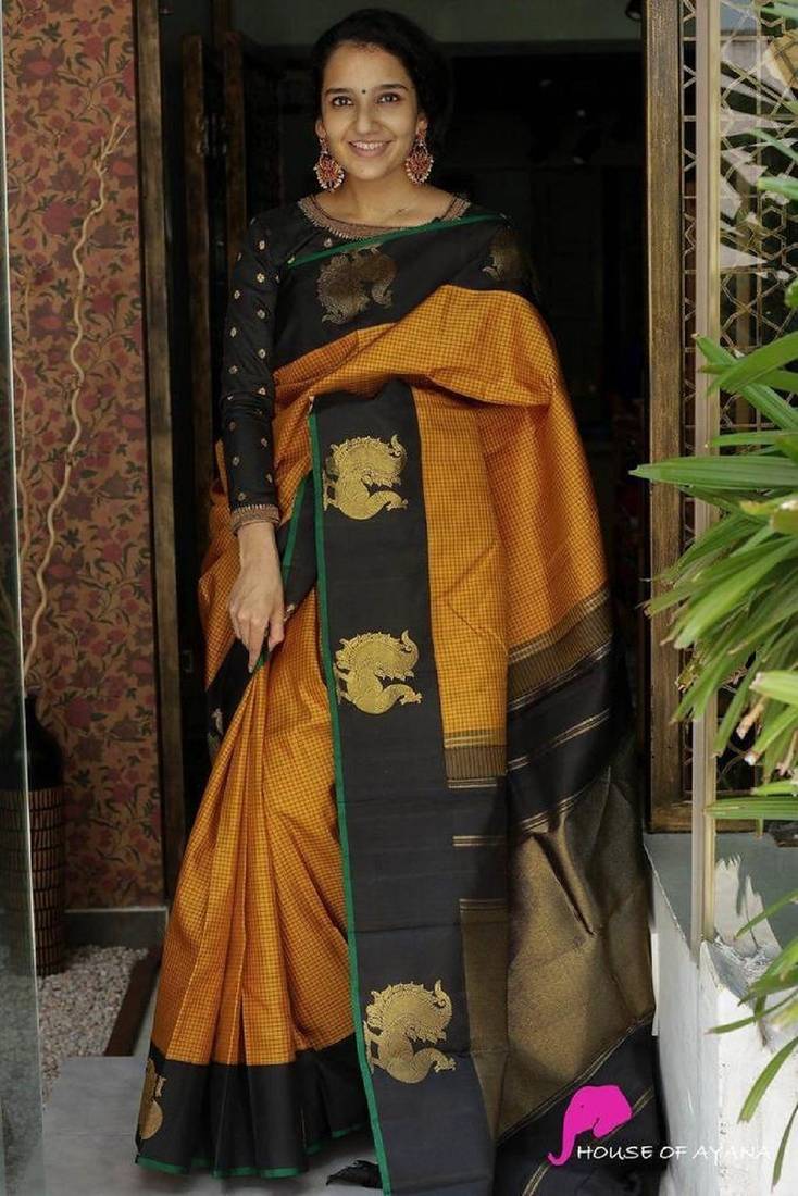 Yellow black soft silk blend banarasi jacuard work designer party wear saree with unstitched blouse piece