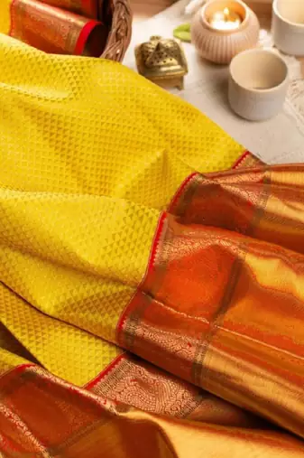 Yellow red silk blend banarasi saree with unstitched blouse piece