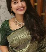 Green silk blend banarasi saree with unstitched blouse piece