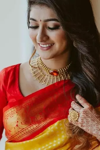 Yellow red silk blend banarasi saree with unstitched blouse piece