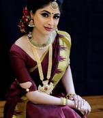 Maroon silk blend banarasi saree with unstitched blouse piece