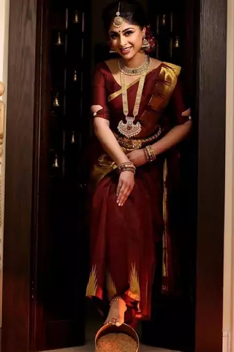 Maroon silk blend banarasi saree with unstitched blouse piece