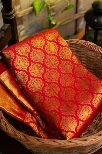 Red silk blend banarasi saree with unstitched blouse piece