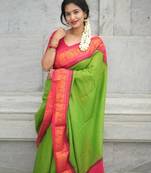 Parrot pink silk blend banarasi saree with unstitched blouse piece