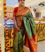Green red silk blend banarasi saree with unstitched blouse piece