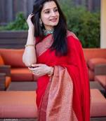 Red silk blend banarasi saree with unstitched blouse piece