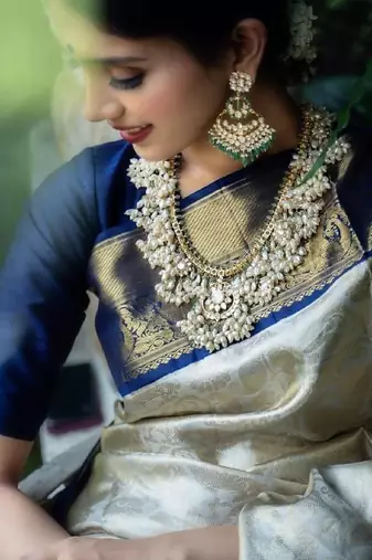 Blue white silk blend banarasi saree with unstitched blouse piece