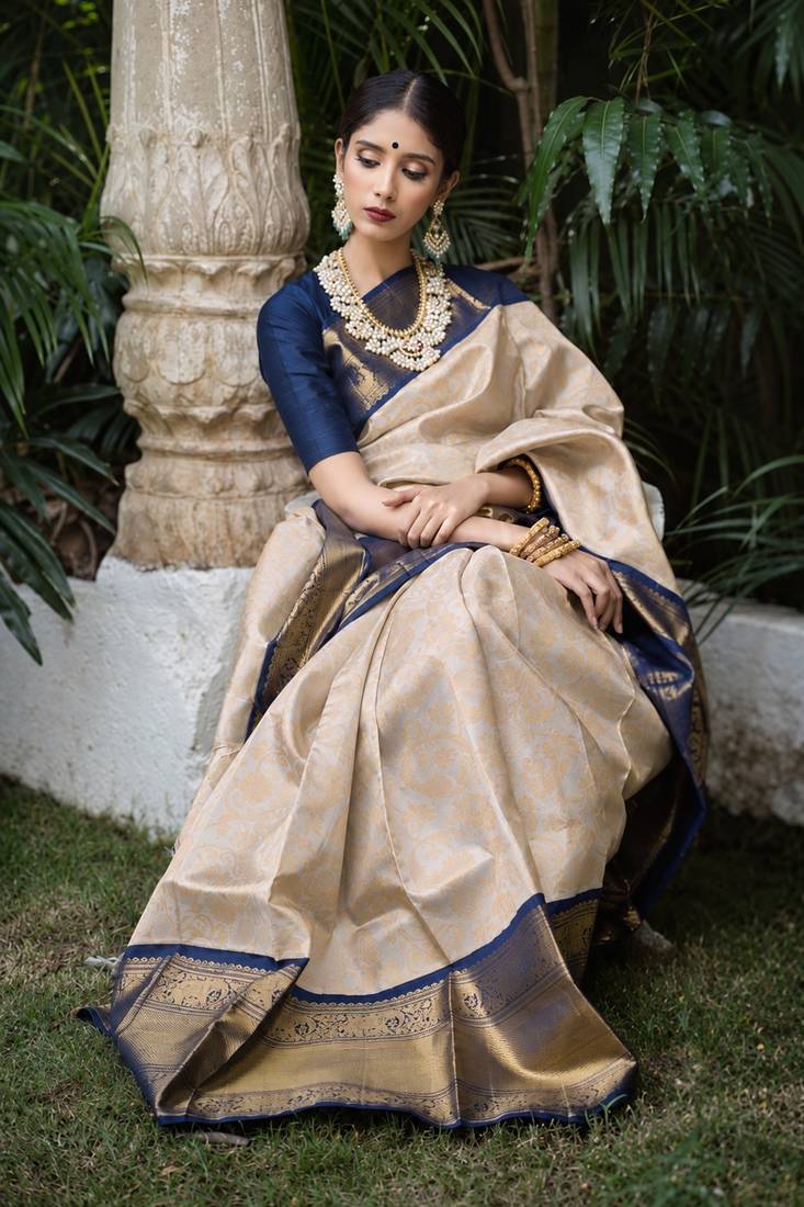 Blue white silk blend banarasi saree with unstitched blouse piece