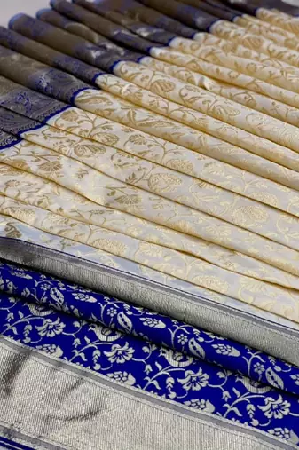 Blue white silk blend banarasi saree with unstitched blouse piece