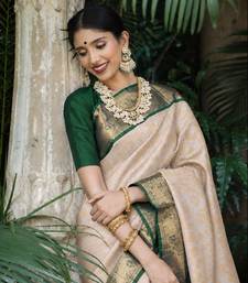 Green white silk blend banarasi saree with unstitched blouse piece