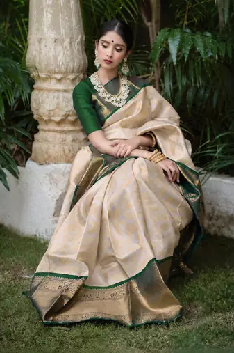Green white silk blend banarasi saree with unstitched blouse piece