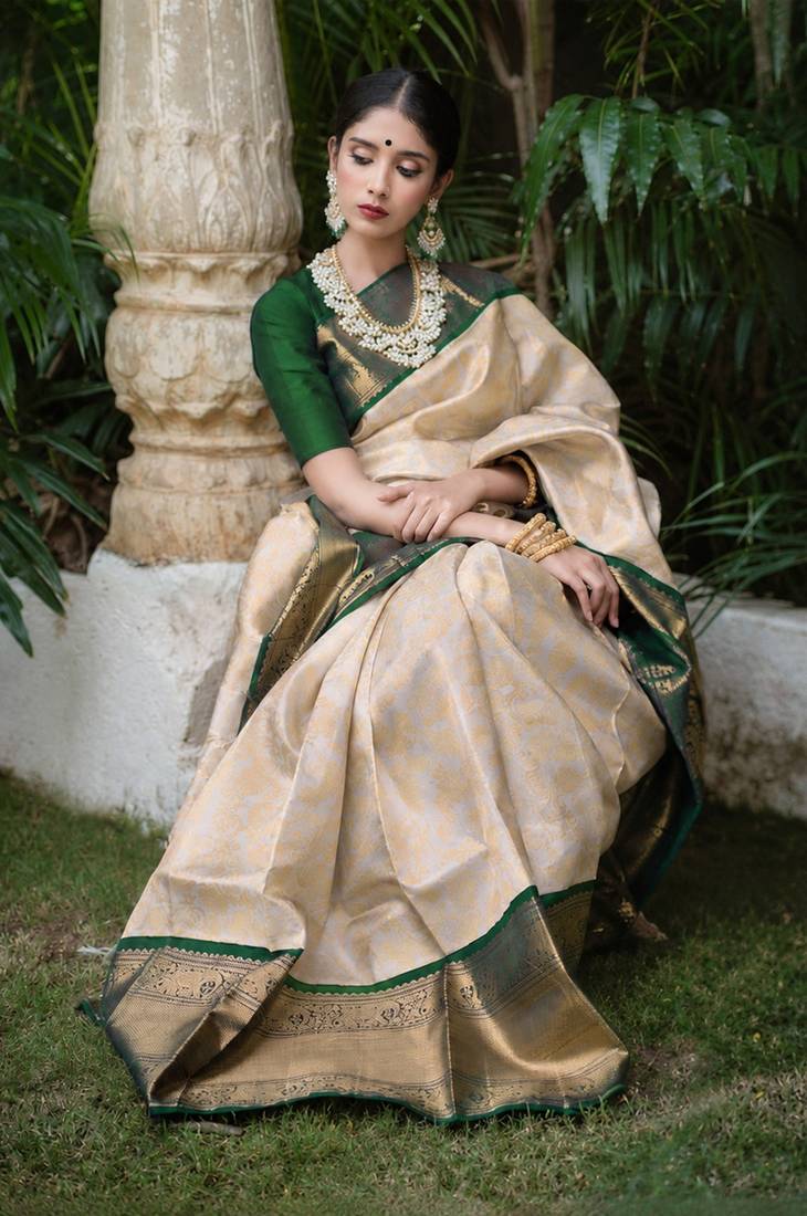 Green white silk blend banarasi saree with unstitched blouse piece