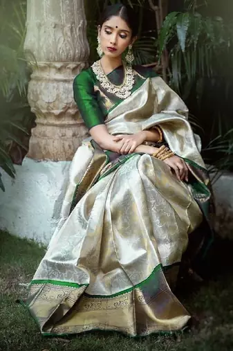 Green white silk blend banarasi saree with unstitched blouse piece
