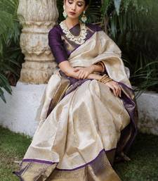 Wine white silk blend banarasi saree with unstitched blouse piece