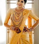 Yellow silk blend banarasi saree with unstitched blouse piece