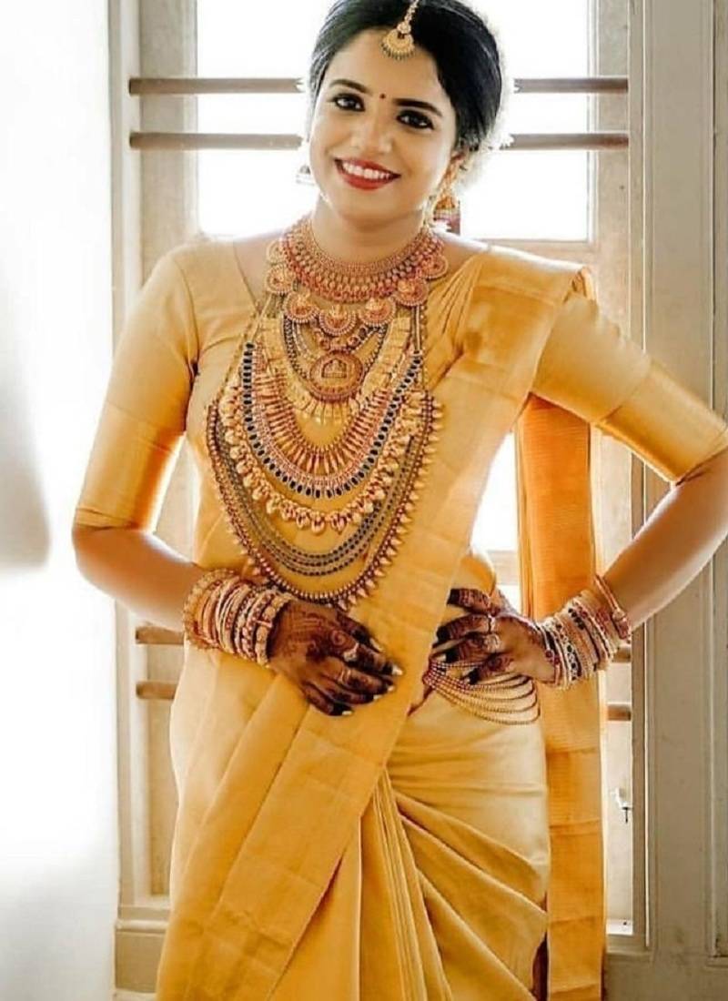 Yellow soft silk blend banarasi jacuard work designer party wear saree with unstitched blouse piece