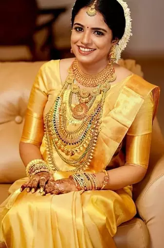 Yellow silk blend banarasi saree with unstitched blouse piece