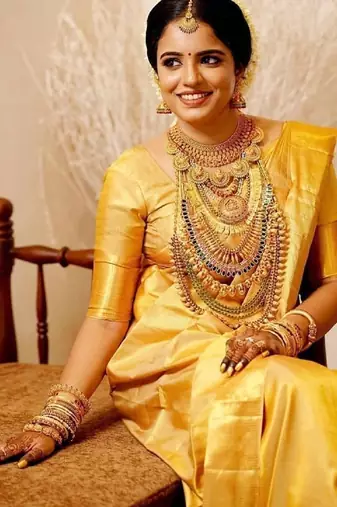 Yellow silk blend banarasi saree with unstitched blouse piece